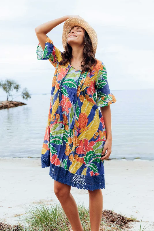 Midi dresses with pleated skirts for a timeless and elegant appeal Cayman Orange Tropical Cotton Tunic Dress Midi dresses with pleated skirts for a timeless and elegant appeal Cayman Orange Tropical Cotton Tunic Dress