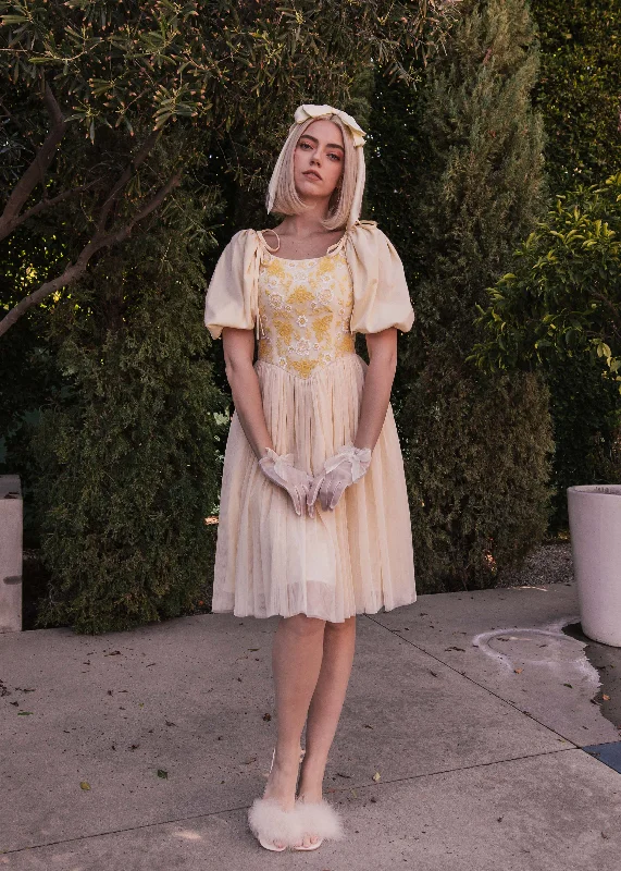 Midi dresses with pom - pom trims for a playful and festive look Honey Bee Dress