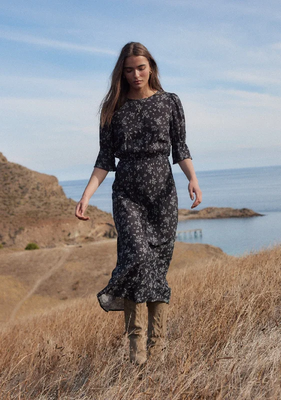 Midi dresses with polka dot prints for a playful summer outfit Aruna Midi Dress