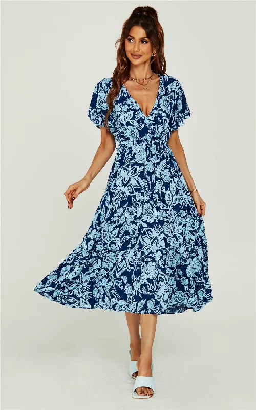 A - line midi dresses with floral prints for spring brunches Hübsches Wickel-Midikleid mit Blumendruck in Blau A - line midi dresses with floral prints for spring brunches Hübsches Wickel-Midikleid mit Blumendruck in Blau