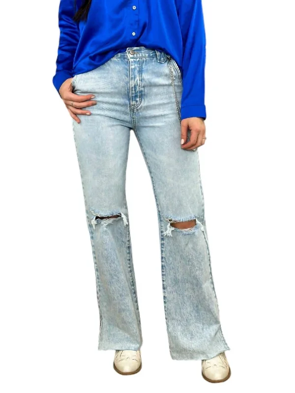 Ripped women jeans for a rebellious and fashion - forward style90's Flare Jeans In Light Wash Ripped women jeans for a rebellious and fashion - forward style90's Flare Jeans In Light Wash