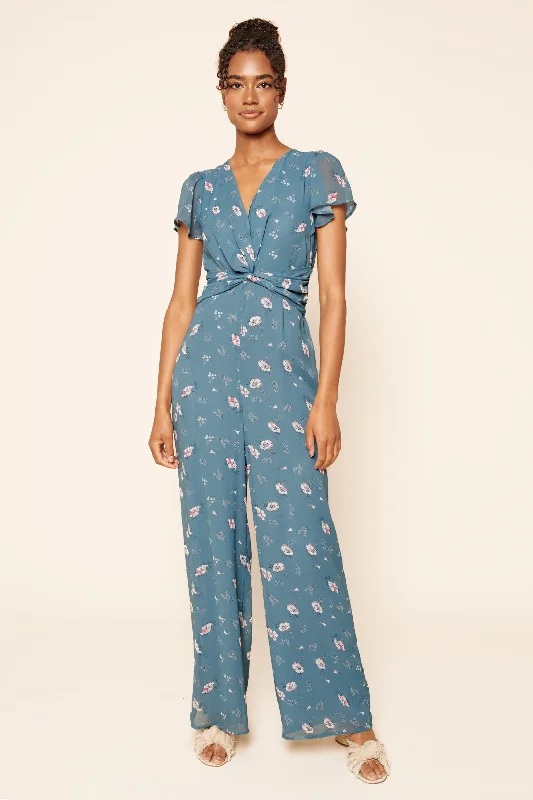 Women jumpsuits with pocket details for added functionality and convenienceSavvy Floral Twist Front Jumpsuit