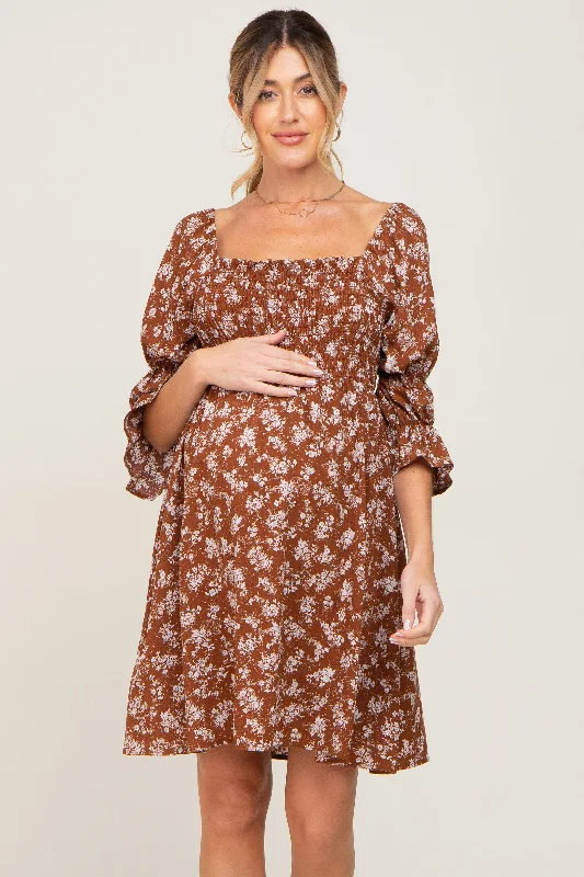 Printed Abstract Women Dress for a Modern and Artistic Appeal Printed Abstract Women Dress for a Modern and Artistic Appeal Brown Floral Ruffle Sleeve Smocked Maternity Dress