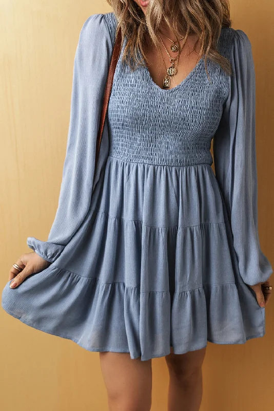 Midi dresses with keyhole backs for a flirty and unexpected detailSolid V-Neck Long Sleeve Mini Dress Midi dresses with keyhole backs for a flirty and unexpected detailSolid V-Neck Long Sleeve Mini Dress