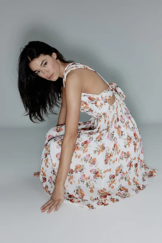 Midi dresses with ribbed textures for a unique and tactile appearanceBecoming Bow Back Midi Dress