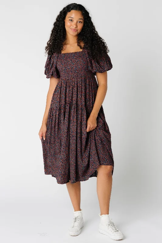 Midi dresses with pleated skirts for a timeless and elegant appealBrass & Roe Falling Smocked Dress Midi dresses with pleated skirts for a timeless and elegant appealBrass & Roe Falling Smocked Dress