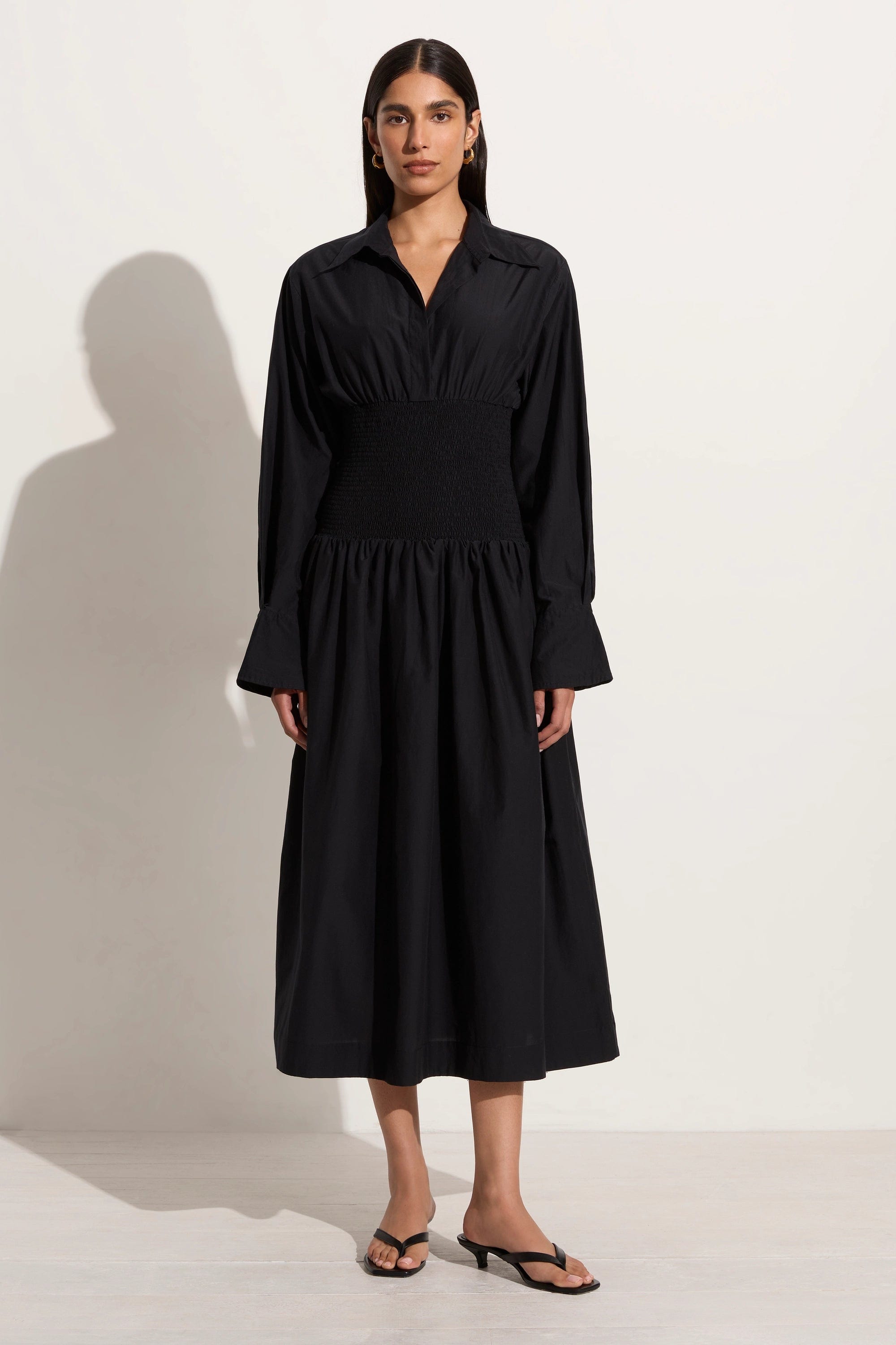 Midi dresses with wrap - around skirts for a customizable fitCervo Midi Dress Black - Final Sale