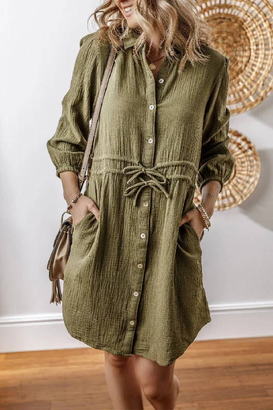 Midi dresses with pom - pom trims for a playful and festive lookTextured 3/4 Sleeve Mini Dress Midi dresses with pom - pom trims for a playful and festive lookTextured 3/4 Sleeve Mini Dress