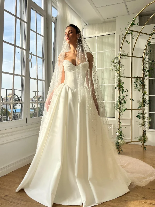 Sleeveless midi dresses with lace details for summer weddingsPearl Veil Gown