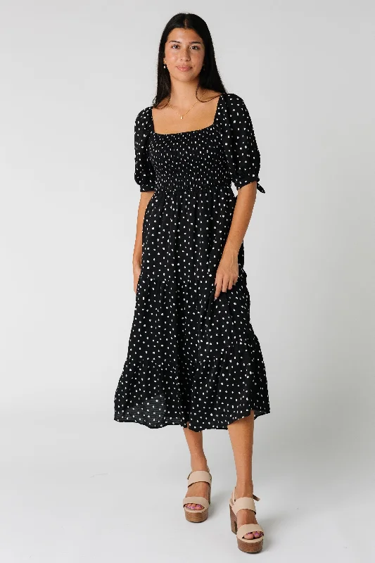 Midi dresses with geometric cutouts for a contemporary and edgy lookThe Rowena Dress