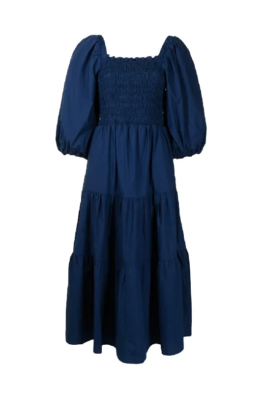 Denim Top with a Metallic Accent for a Shiny LookSea NY Claudine Puff Sleeve Smocked Dress - Blue