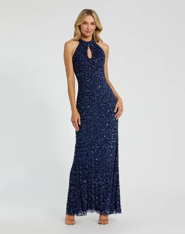 Maxi dresses with cut - out details on the sides for a modern edgeEmbellished Halter Neck Keyhole Gown