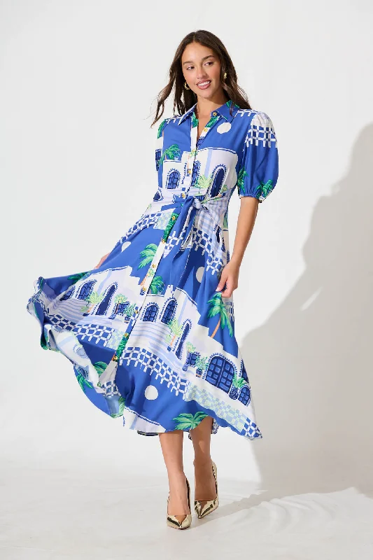 Ruffled maxi dresses with a tiered skirt for added volumeBella Maxi Shirt Dress in Blue with White Print Ruffled maxi dresses with a tiered skirt for added volumeBella Maxi Shirt Dress in Blue with White Print