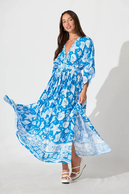 Maxi dresses with a halter neck for a stylish and sophisticated choiceBreak Free Maxi Dress In Blue and White Shell Print Maxi dresses with a halter neck for a stylish and sophisticated choiceBreak Free Maxi Dress In Blue and White Shell Print