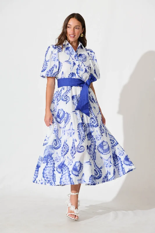 Linen maxi dresses for a breathable and lightweight summer optionCacia Maxi Shirt Dress In White With Blue Print Linen Blend Linen maxi dresses for a breathable and lightweight summer optionCacia Maxi Shirt Dress In White With Blue Print Linen Blend