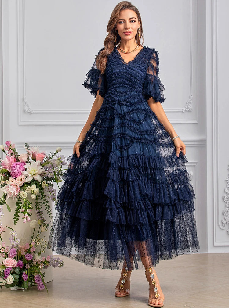 Maxi dresses with pom - pom trims for a playful and festive lookDRESS STYLE  - SY1449
