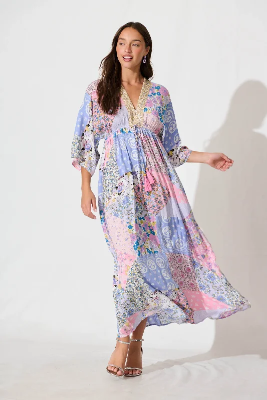 Ruffled maxi dresses with a tiered skirt for added volumeJaneve Maxi Dress in Pink with Blue Patchwork Print Ruffled maxi dresses with a tiered skirt for added volumeJaneve Maxi Dress in Pink with Blue Patchwork Print