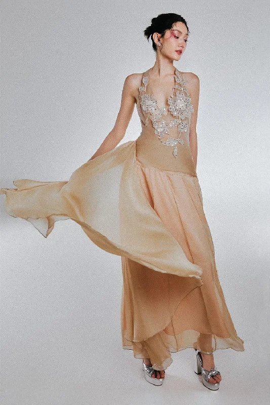 Maxi dresses with a ruched bodice for a more form - fitting and feminine shapeManila Drop Waist Halter Neck Voile Maxi Dress