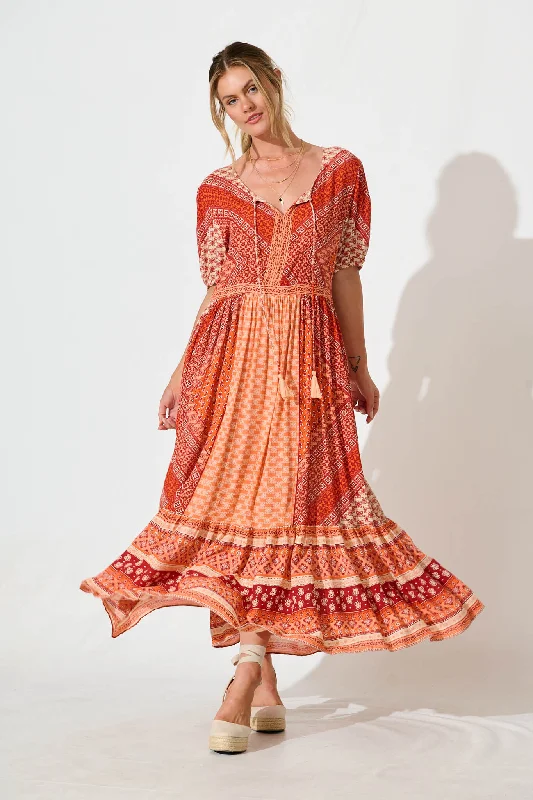 Maxi dresses with pocket details for added functionalityMinara Maxi Dress in Multi Orange Patchwork