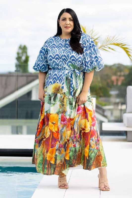 Maxi dresses with fringe trim for a bohemian vibePansy Maxi Dress
