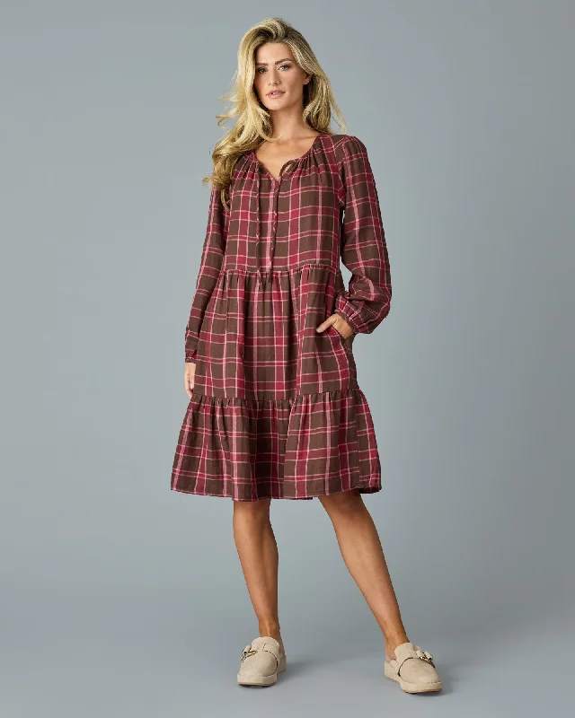 Mini dresses with pocket details for added functionalityLara Dress
