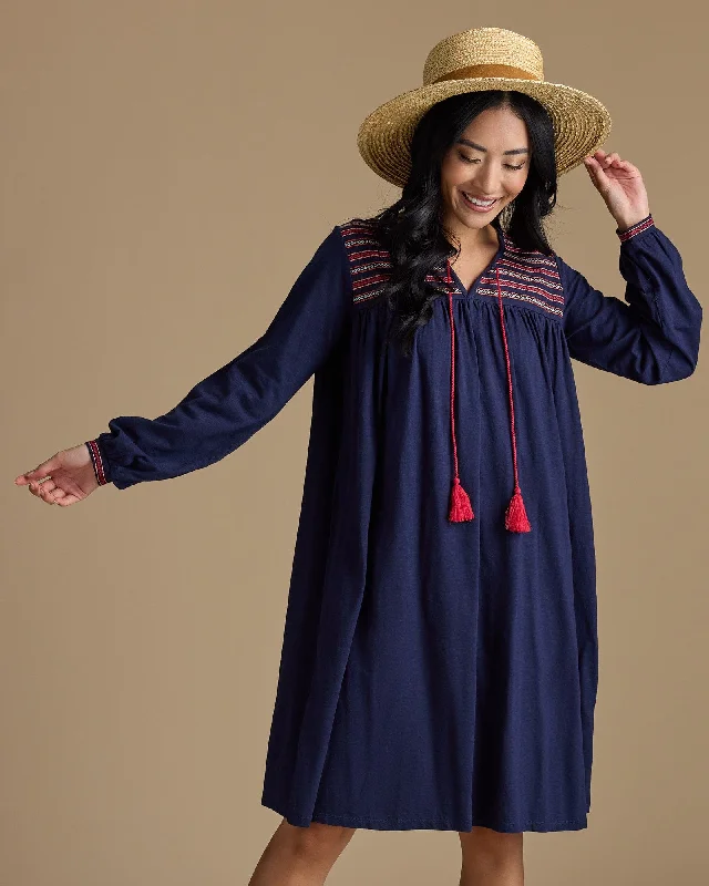 Mini dresses with side slits for a sexy appealMadeline Tassel Dress