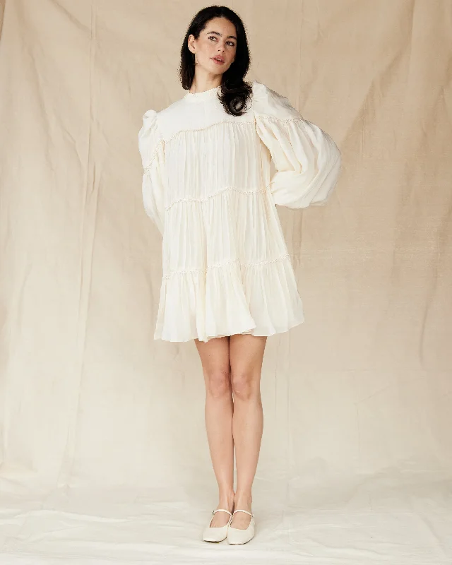 Mini dresses with side slits for a sexy appealZenya | White