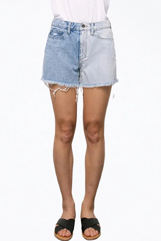 Embroidered Women Shorts with Intricate DesignsHigh-Rise Two-Tone Distressed Denim Shorts In Blue Embroidered Women Shorts with Intricate DesignsHigh-Rise Two-Tone Distressed Denim Shorts In Blue