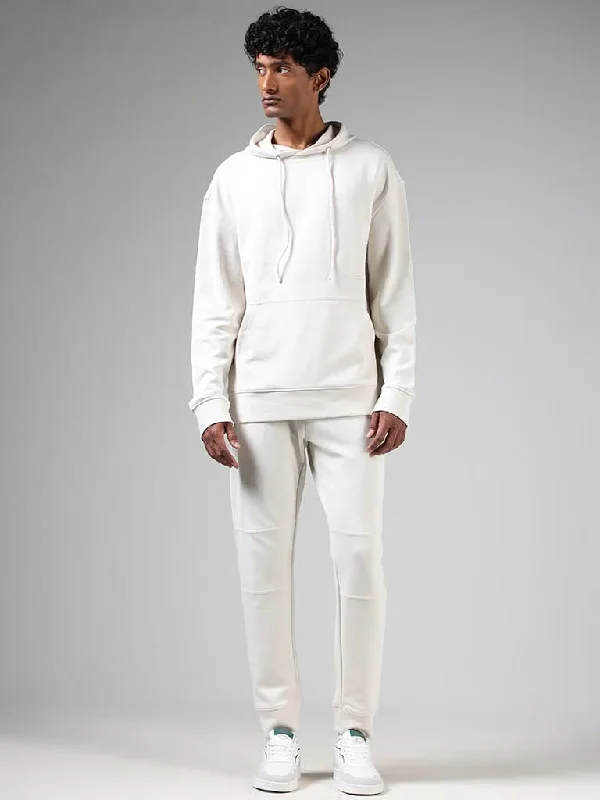 Bermuda Women Shorts for a Classic and Sophisticated LookStudiofit Off White Relaxed-Fit Mid-Rise Joggers Bermuda Women Shorts for a Classic and Sophisticated LookStudiofit Off White Relaxed-Fit Mid-Rise Joggers